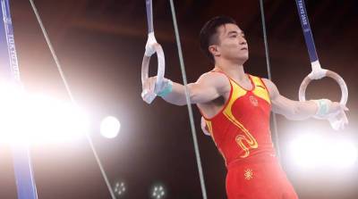 Китайские гимнасты стали лучшими в упражнениях на кольцах