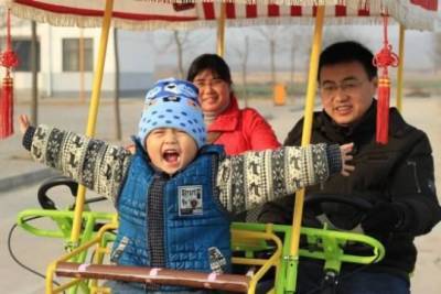 Китайский парламент разрешил гражданам рожать до троих детей