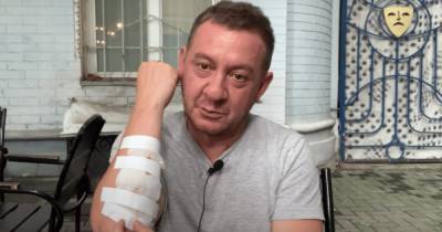 После виски и пива. Выпивший Муждабаев упал и повредил руку в центре Киева (видео)
