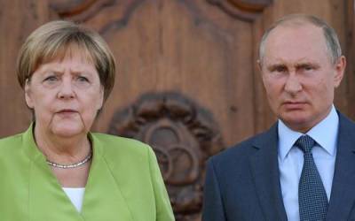 Путин и Меркель обсудили ситуацию на юго-востоке Украины