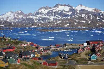 В Гренландии на одной из вершин ледникового щита пошел дождь вместо снега и мира
