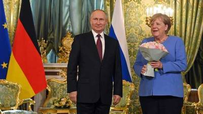 Одни розы и никаких уступок — Der Spiegel об «отрезвляющей прощальной встрече» Путина и Меркель