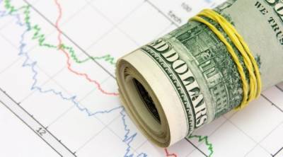Доллар начал неделю откатом по отношению к рублю и мировым валютам