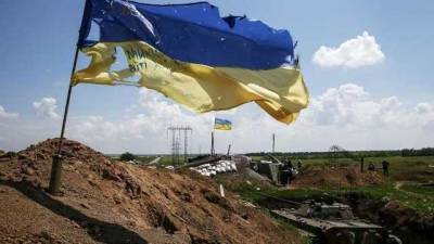 Развевается на передовой: военные поздравили украинцев с Днем Флага