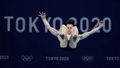 Китаец Се Сыи стал олимпийским чемпионом по прыжкам в воду с трамплина