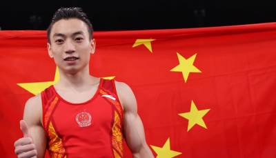 Китаец Цзоу Цзиньюан стал олимпийским чемпионом на параллельных брусьях. Украинец Пахнюк — седьмой
