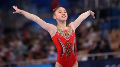 Китайская гимнастка Гуань завоевала золото в упражнениях на бревне на Олимпиаде