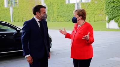 Меркель обсудила с Макроном ситуацию в Афганистане