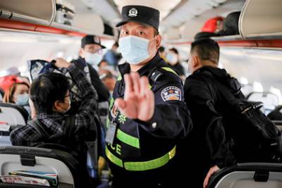 Китай временно перестанет выдавать загранпаспорта своим гражданам