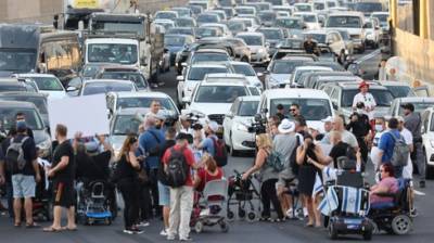 Инвалиды блокировали автотрассу Аялон: "Не дадим пополнить казну за наш счет"