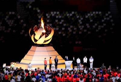 Олимпийский огонь погасили в Токио