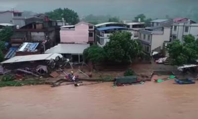 В Китае открыли специальные стоянки для авто, пострадавших в результате наводнения и мира