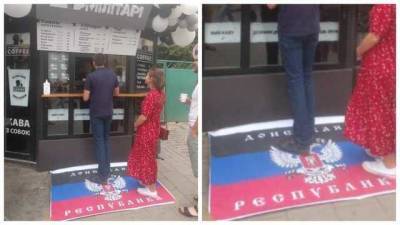Вместо коврика – флаг боевиков: во Львове местное кафе порадовало посетителей