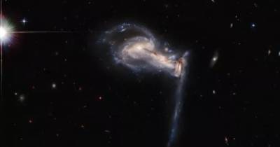Изображения Хаббла показали судьбу Млечного Пути в битве трех галактик