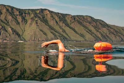 Россияне преодолели 120 километров в рамках экозаплыва за чистоту Байкала - lenta.ru - Байкальск