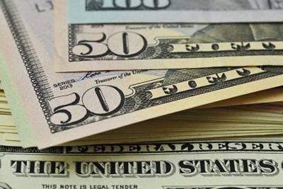Курс доллара восстанавливается после снижения накануне до минимума за три недели