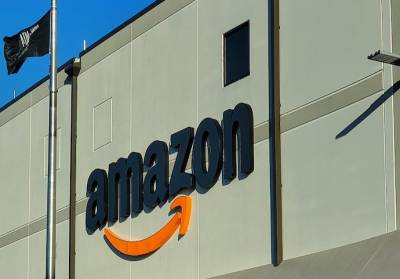 Amazon будет платить 50 фунтов работникам, которые вовремя приходят на работу