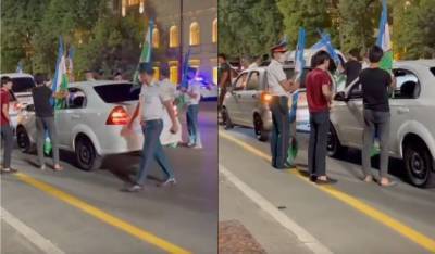 Узбеки на радостях посрывали национальные флаги