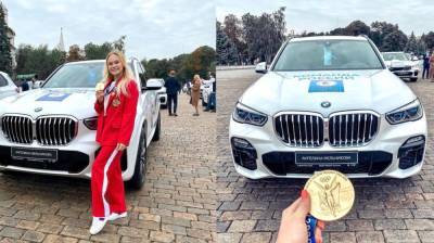 Дмитрий Медведев вручил воронежской гимнастке Ангелине Мельниковой ключи от BMW X5