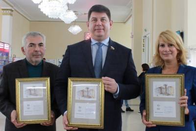 В честь 90-летия здания Ивановского почтамта состоялось спецгашение открыток