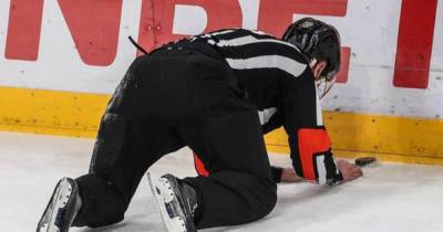 Хватался за бортик и падал на лед: в России пьяный арбитр судил хоккейный матч (видео)