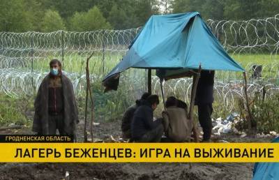 Белорусы передают застрявшим на границе мигрантам теплую одежду и еду