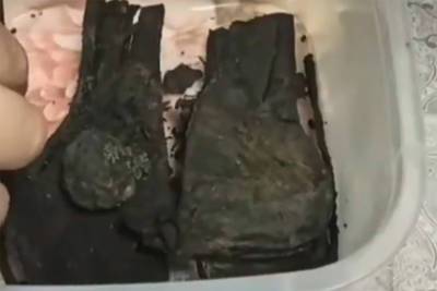 В Пскове археологи нашли кожаную сумку с лежащими в ней вещами