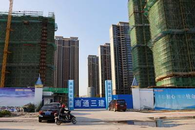 Китай защитит покупателей жилья от краха застройщика