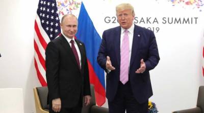 “Привлекательная брюнетка”: в США “раскрыли” отвлекающий маневр Путина на встрече с Трампом