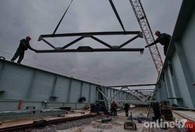 Фоторепортаж: главная дорожная стройка Киришей, или как над Волховом новый мост воздвигают
