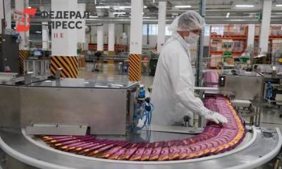 Дмитрий Азаров и глава российского отделения «Нестле» запустили обновленную линию на кондитерской фабрике