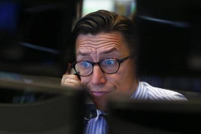 S&P 500 закрылся снижением, техгиганты подняли Nasdaq до рекордного уровня