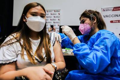 В Японии создадут вакцину от коронавируса с пожизненной защитой
