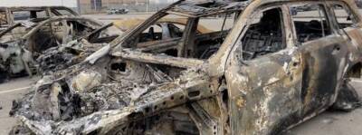 В Казахстане из сожженных машин извлекли останки 18 человек