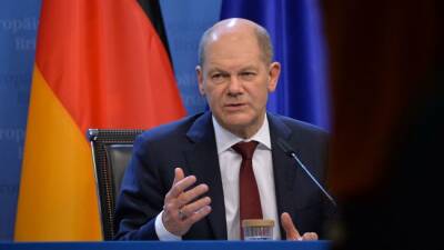 Канцлер ФРГ: Санкции против России не будут безболезненными для Германии