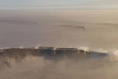 Окруженный угольными разрезами Киселевск пропал под смогом