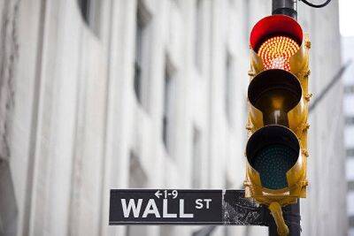 Американские фондовые индексы закрыли торги среды снижением после двухдневного ралли