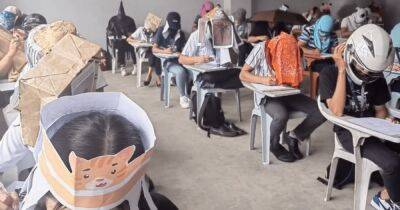 Чумной Доктор и Крик: на Филиппинах студентов обязали носить "шляпы против списывания" (фото)