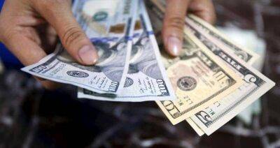 Средний курс доллара США со сроком расчетов "завтра" по итогам торгов составил 60,3833 руб.