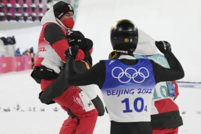 Австрийцы выиграли командный турнир прыгунов с трамплина в Пекине