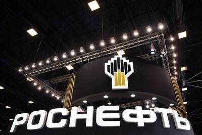 Московская биржа понизила границу ценового коридора дешевеющих на 11% акций "Роснефти"