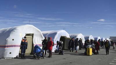 В Кремле назвали временным пребывание беженцев из ДНР и ЛНР в России