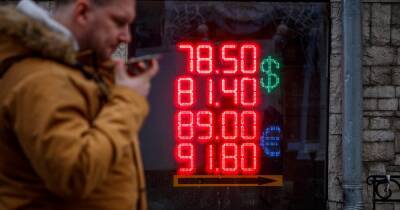 Странная стабильность. Почему российские биржи не рухнули из-за признания Путиным ОРДЛО