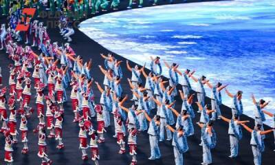 Российские олимпийцы вышли на парад атлетов в Пекине