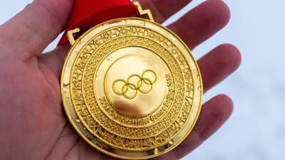 Китайские спортсмены завоевали первое золото домашней Олимпиады