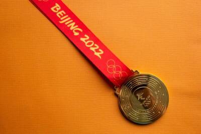 США завоевали первую медаль на Олимпийских играх в Пекине и мира