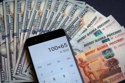 Доллар за неделю упал на 9,43 рубля, евро - на 6,23 рубля