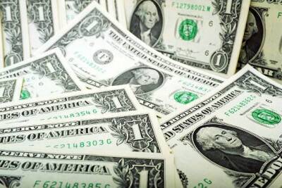 Курс доллара растет до максимальных за семь лет 121,64 иены за доллар на комментариях ФРС США