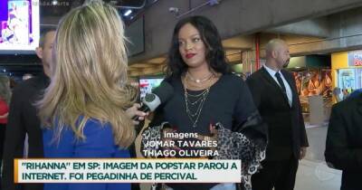 Фейковая Рианна позволяет фанатам целовать свой накладной живот в Бразилии