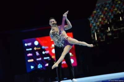 В Баку стартовал второй день Всемирных соревнований среди возрастных групп по акробатической гимнастике (ФОТО)